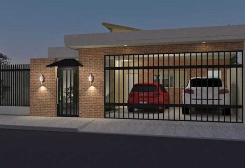 Visão noturna da fachada do projeto de modulação de uma casa térrea rústica usando os tijolos ecológico à base de solo cimento